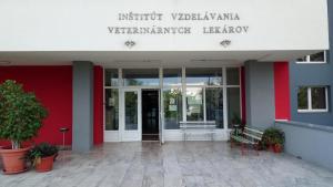 a building with a sign that reads insulin vaughan vaughan ranger library at Penzión Inštitút in Košice