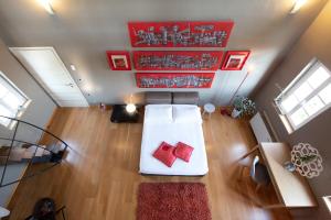 Letto o letti in una camera di Klinec Plešivo Art Rooms