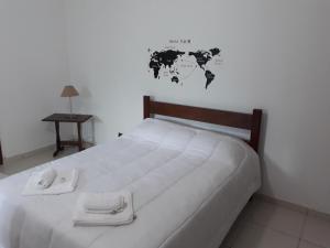 Postel nebo postele na pokoji v ubytování Itaúna Hostel