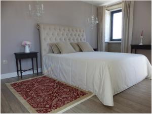 Cama o camas de una habitación en Casa das Castas Wine Guesthouse