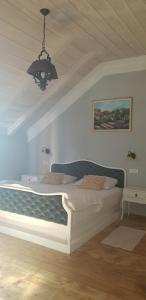 Posteľ alebo postele v izbe v ubytovaní Guest House Kozjak