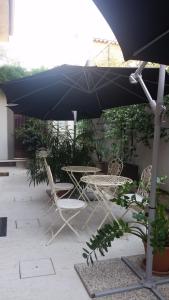 Patio nebo venkovní prostory v ubytování Corte Merighi Charming Rooms