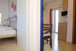 Postel nebo postele na pokoji v ubytování Panorama Elafonisos