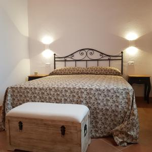 A bed or beds in a room at Agriturismo La Fonte