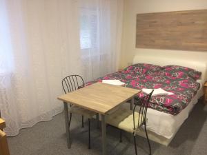 Postel nebo postele na pokoji v ubytování Apartmán Brno Jelenice
