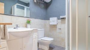 Koupelna v ubytování Apartamento Llorens + 37 fotografií