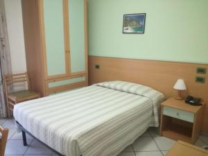 Postel nebo postele na pokoji v ubytování Hotel Zilema