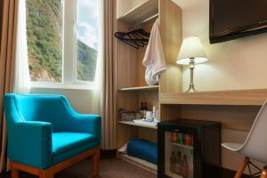 Posezení v ubytování Inti Punku Machupicchu Hotel & Suites