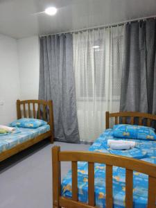 Postel nebo postele na pokoji v ubytování Comfort Plus