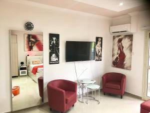 Posezení v ubytování Paphos gardens studio suite