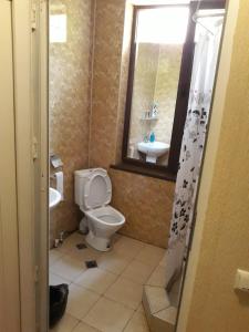 Koupelna v ubytování Guesthouse Gia
