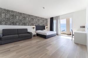 Posezení v ubytování Hotel Columbia & Ninfea