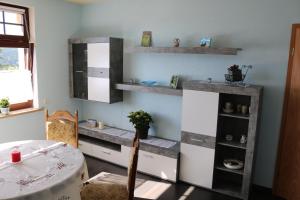 Kuchyň nebo kuchyňský kout v ubytování Ferienwohnung Gläser + 17 fotografií