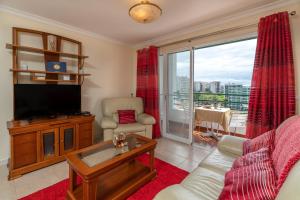 Μια τηλεόραση ή/και κέντρο ψυχαγωγίας στο Apartamento Rodrigues