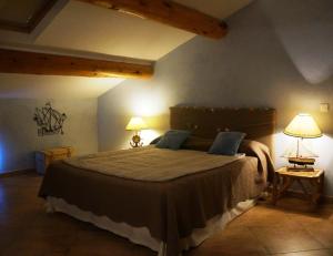 Postel nebo postele na pokoji v ubytování Hotel Le Saint Jean