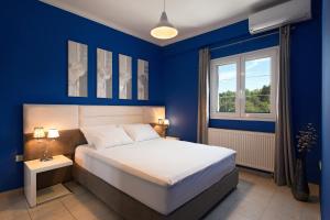 Voodi või voodid majutusasutuse Corfu City Design Residence toas