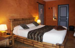 Postel nebo postele na pokoji v ubytování Hotel Le Saint Jean
