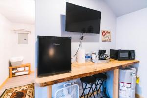 Kuchyň nebo kuchyňský kout v ubytování Cache Cabins