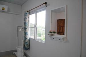 Ванная комната в Nawee GuestHouse Sairee