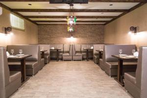 Posezení v ubytování De'Mar Hotel
