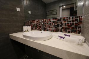Koupelna v ubytování WIWO Hotel