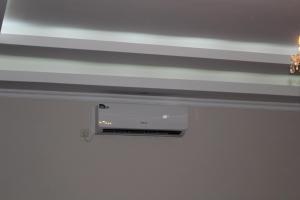 a wall mounted air conditioner on a ceiling at Villa Near The Batumi in Batumi