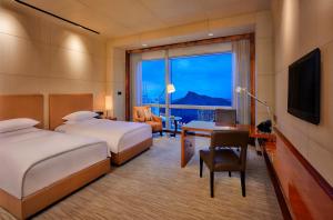 Postel nebo postele na pokoji v ubytování Grand Hyatt Shenzhen + 37 fotografií