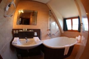 Koupelna v ubytování Hotel Fortna