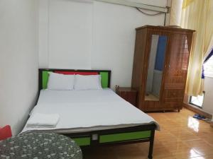 Giường trong phòng chung tại Ngoc Phung Guesthouse