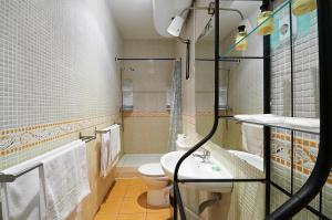 Łazienka w obiekcie Suites You Zinc