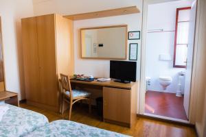 Postel nebo postele na pokoji v ubytování Locanda Solagna