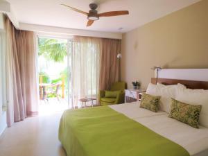 Postel nebo postele na pokoji v ubytování Ein Gedi Kibbutz Hotel + 37 fotografií