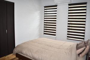 Кровать или кровати в номере Sol e Mar