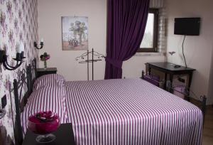 Postel nebo postele na pokoji v ubytování GaiaChiara Resort