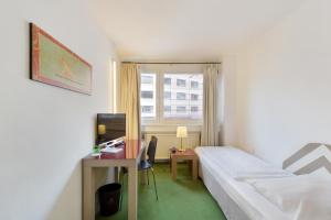 Ein Bett oder Betten in einem Zimmer der Unterkunft Hotel Neutor Express