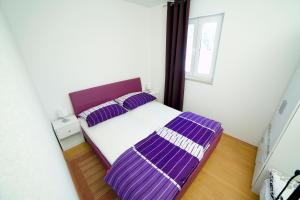 Postel nebo postele na pokoji v ubytování Apartments 1234