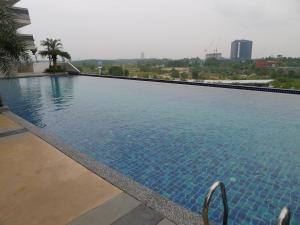 a large swimming pool on top of a building at KiddyPalace@Meridin in Nusajaya
