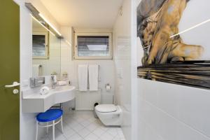 Ein Badezimmer in der Unterkunft Hotel Neutor Express