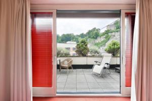 Ein Balkon oder eine Terrasse in der Unterkunft Hotel Neutor Express