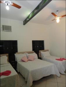 Postel nebo postele na pokoji v ubytování Hotel Royal Class