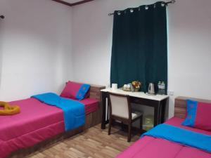 Cama o camas de una habitación en Sichang Hut