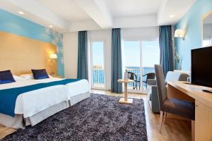 Кровать или кровати в номере Universal Hotel Cabo Blanco - Adults Only