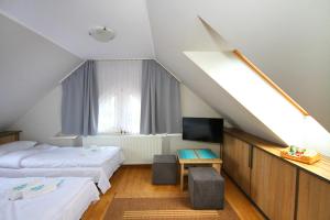 Posteľ alebo postele v izbe v ubytovaní Apartamenty Olsztyn
