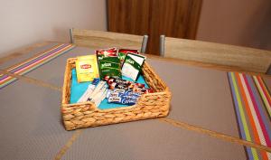 a basket sitting on top of a table at Apartamenty Olsztyn in Olsztyn