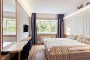 Krevet ili kreveti u jedinici u okviru objekta Rannahotell