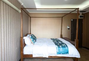 Postel nebo postele na pokoji v ubytování A Lanna Boutique House