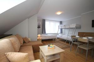 Posedenie v ubytovaní Apartamenty Olsztyn