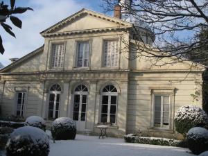 an old house covered in snow at Le Belvédère,studio in Bléré +29 photos