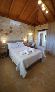 A bed or beds in a room at Villa Esperia