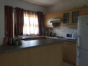 Kuhinja oz. manjša kuhinja v nastanitvi Apartment Tamarinier Complexe
